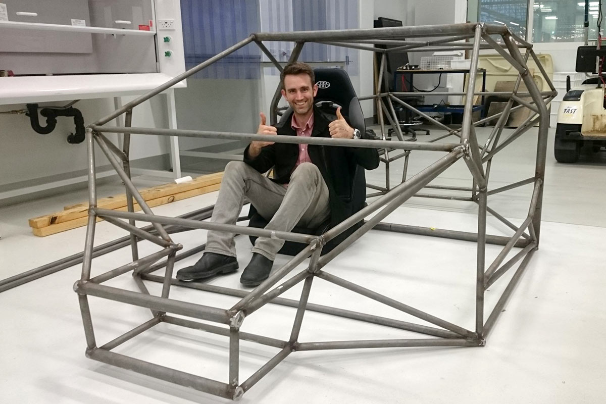 Dr Stuart Wildy inside the Investigator #Mark III solar electric vehicle chassis.