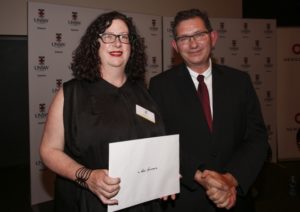 Dr Alice Gorman receives her prize from UNSW President and Vice-Chancellor Professor Ian Jacobs in Sydney this week.