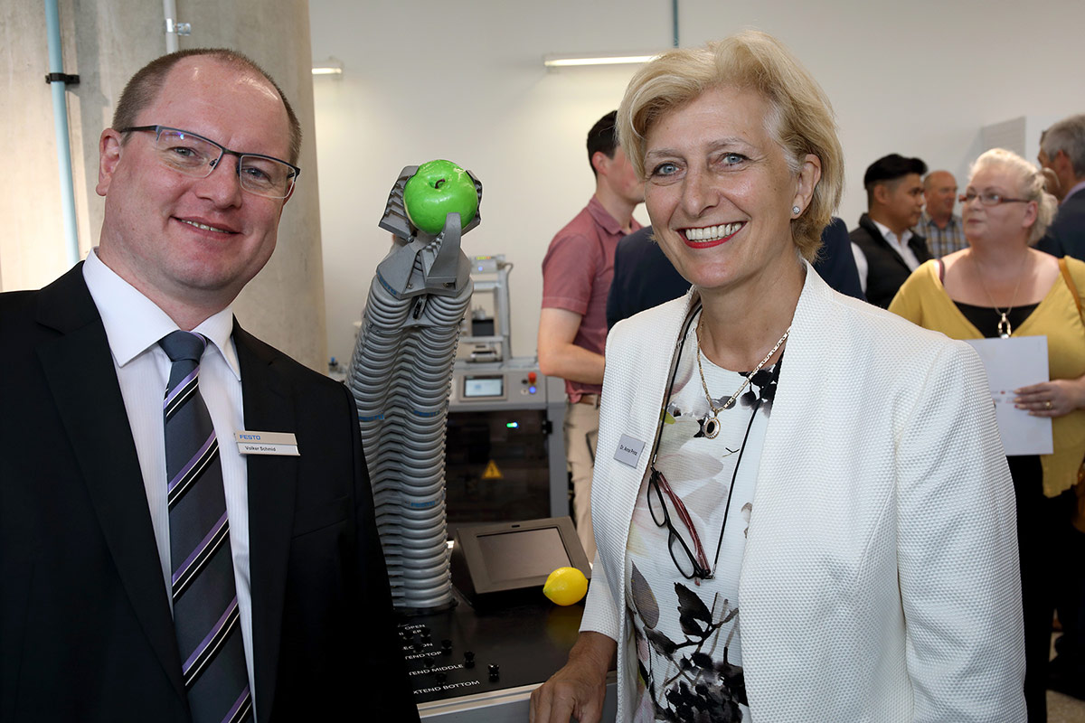 Volker Schmid, Head of Asia Pacific for Festo Didactic, and Ambassador Dr Anna Prinz, German Ambassador to Australia, with the Festo Bionic Handling Assistant at the Tonsley Manufacturing Innovation (TMI) Hub launch earlier today.