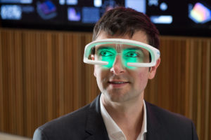 Re-Timer CEO Ben Olsen wearing the light therapy glasses. Photo: Re-Timer