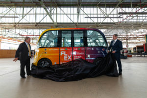 Flinders University Chancellor Mr Stephen Gerlach AM (Left) and SA Minister for Transport, Infrastructure and Local Government Hon. Stephan Knoll unveil the Flinders Express autonomous shuttle at Flinders at Tonsley earlier today.