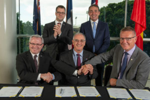 All smiles as partners seal a deal for autonomous maritime vehicle research and development. Standing (L-R) Mr Loïg Chesnais-Girard, President, Regional Council of Brittany; the Hon. Steven Marshall, Premier of South Australia. Seated (L-R) Mr Pascal Pinot, Director, ENSTA Bretagne; Mr Hervé Guillou, Chairman and CEO of Naval Group; Professor Colin Stirling, President and Vice-Chancellor of Flinders University.